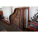 A baby grand piano by J L Duysen