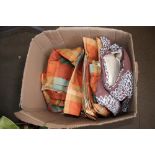 A box of various curtains
