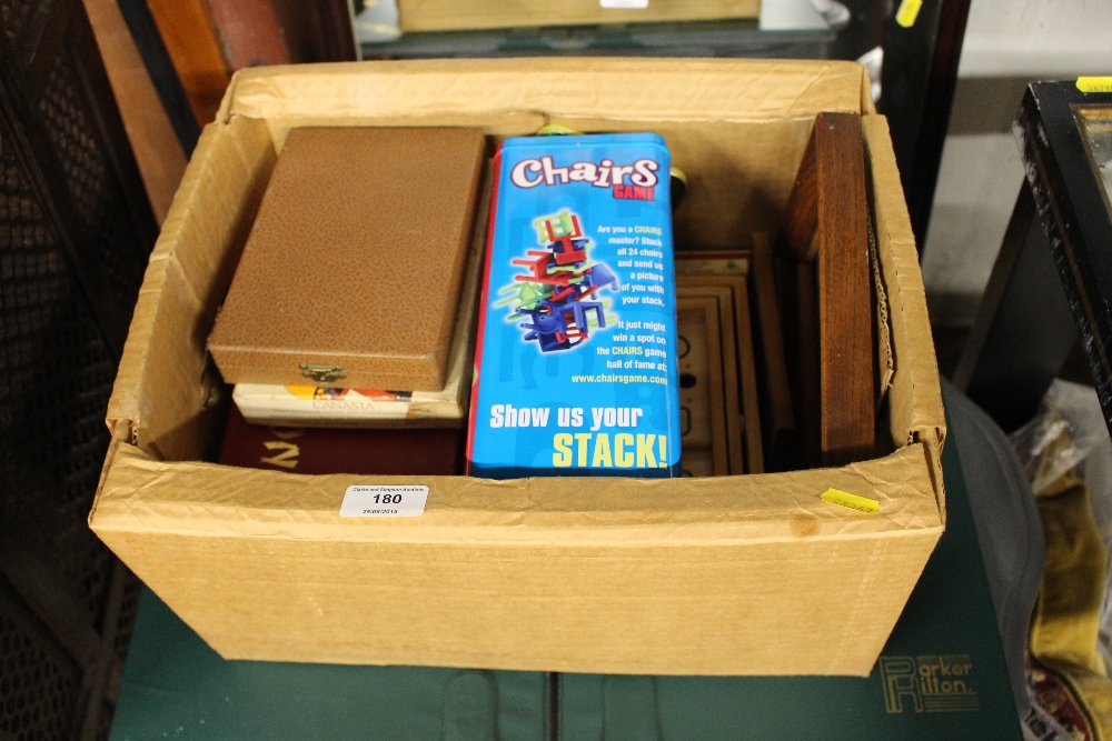 A box of various games; and a Porta Puzzle