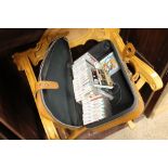 A suitcase containing Nintendo DS and various game