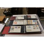 Three albums of First Day covers