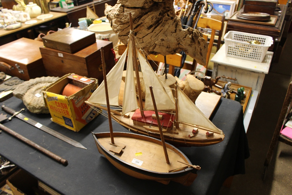 Two wooden model boats