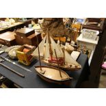 Two wooden model boats