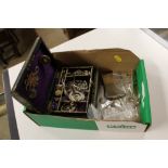 A box of silver and white metal jewellery etc.