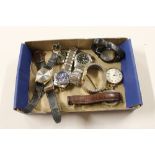 A tray of various wrist watches