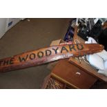 A wooden sign 'The Wood Yard'
