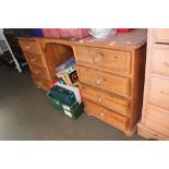 A pine dressing table fitted eight drawers