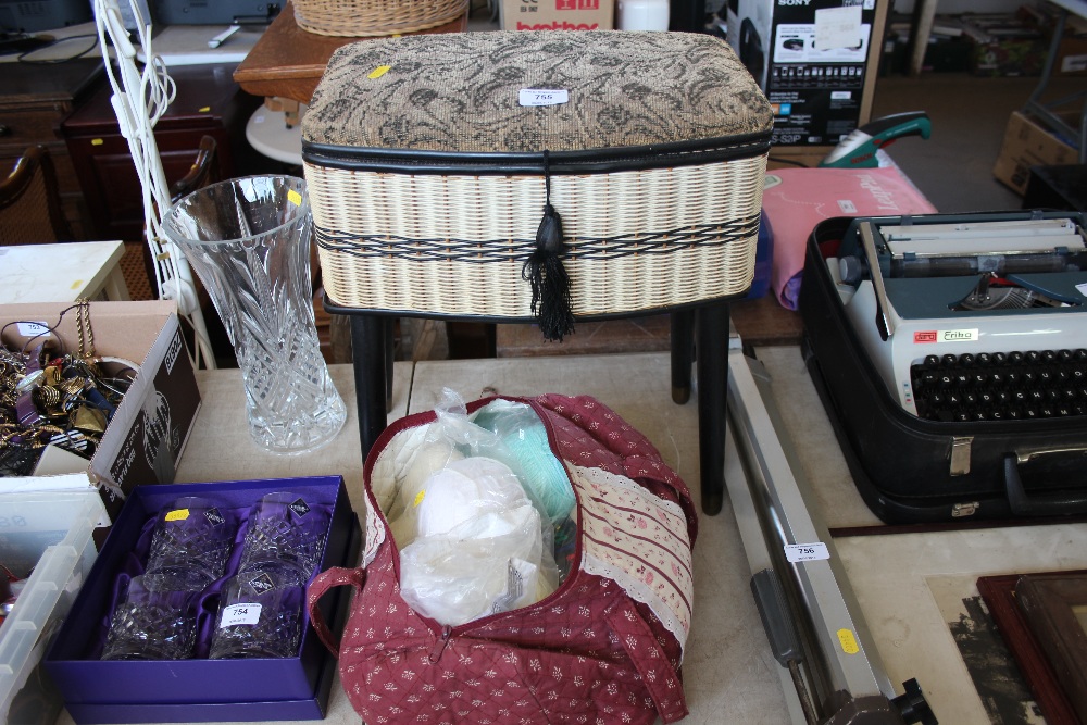 An upholstered sewing box and contents and a bag o