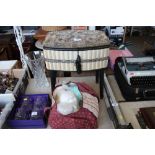 An upholstered sewing box and contents and a bag o