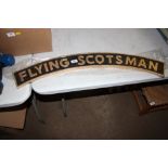 A reproduction flying Scotsman sign