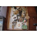 A box of various badges etc