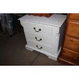 A white painted three drawer chest