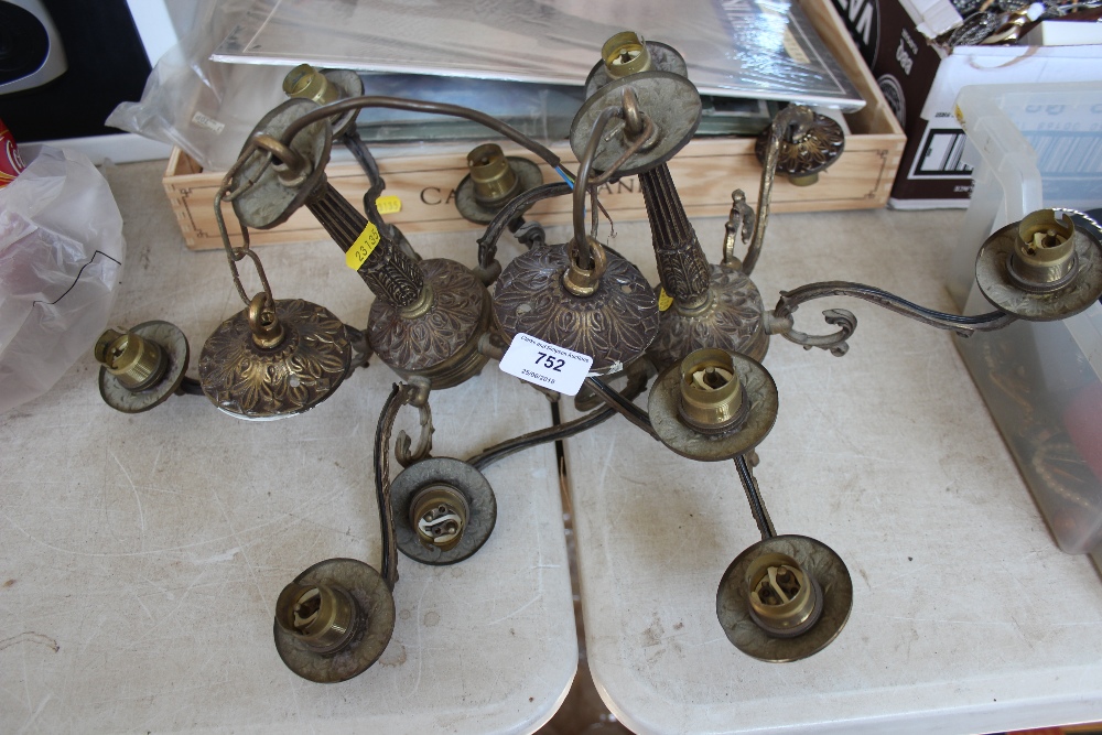 A pair of brass ceiling lights