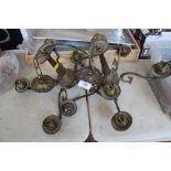 A pair of brass ceiling lights