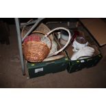 Two boxes containing wicker baskets and various pl