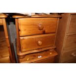 A pine two drawer bedside chest