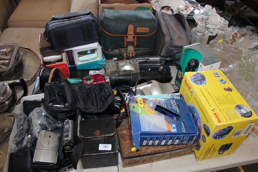 A large quantity of cameras and lenses etc