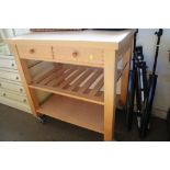 A kitchen trolley fitted two drawers