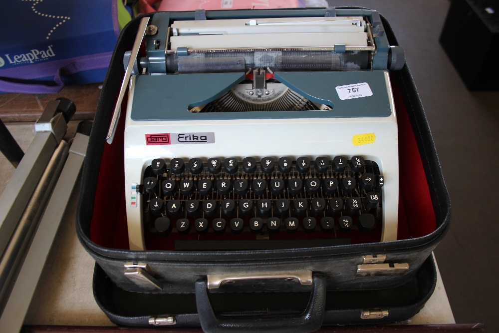 An Erika portable typewriter in carrying case