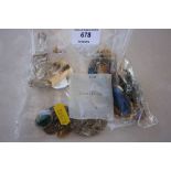 A bag of various costume jewellery