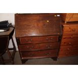 A mahogany bureau fitted three drawers