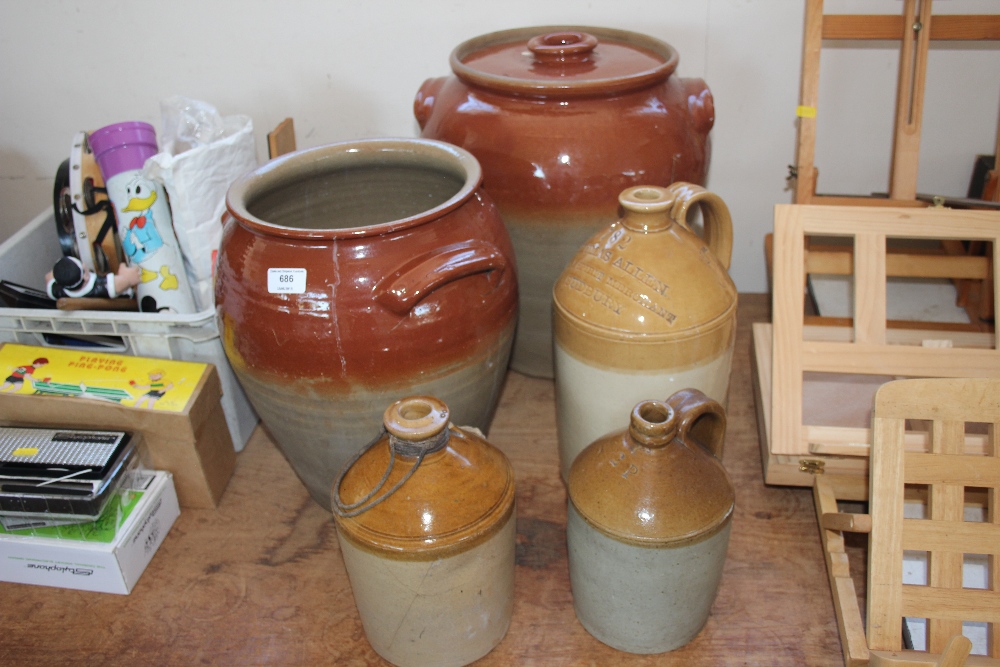 Two glazed jars and three stoneware flagons