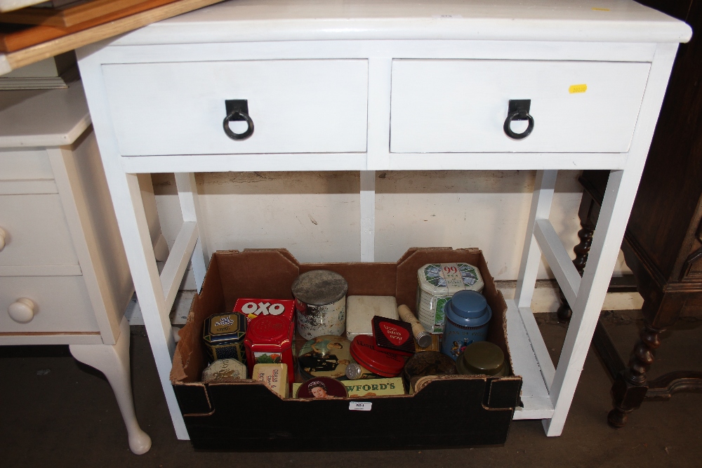 A white painted two drawer hall table