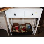 A white painted two drawer hall table