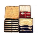 A cased silver Christening fork and spoon, London 1858; another, Birmingham 1959; and a cased set of