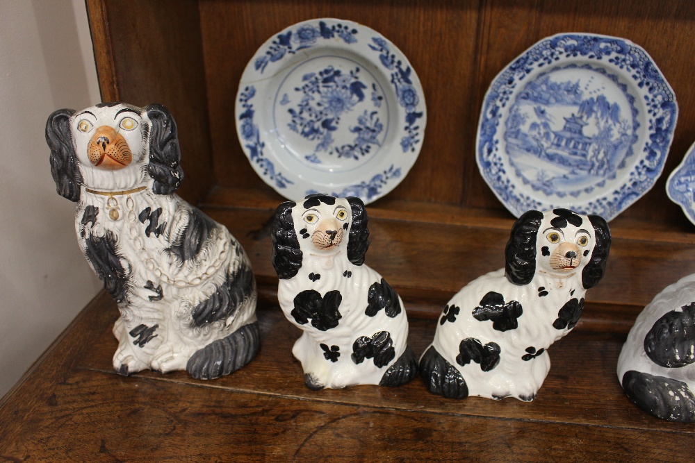 Four pairs of Victorian Staffordshire black and white spaniel ornaments; and a larger similar - Image 4 of 4