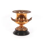 A 19th Century copper campana shaped wine cooler, with acanthus border on circular spread foot,