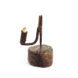 A primitive late 17th/early 18th Century wood and iron rush light, 8cm high