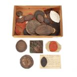 A collection of various interesting Antique wax and other seals