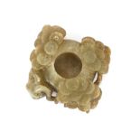 A jade flower encrusted Chinese brush washer, of shallow form, 12cm overall