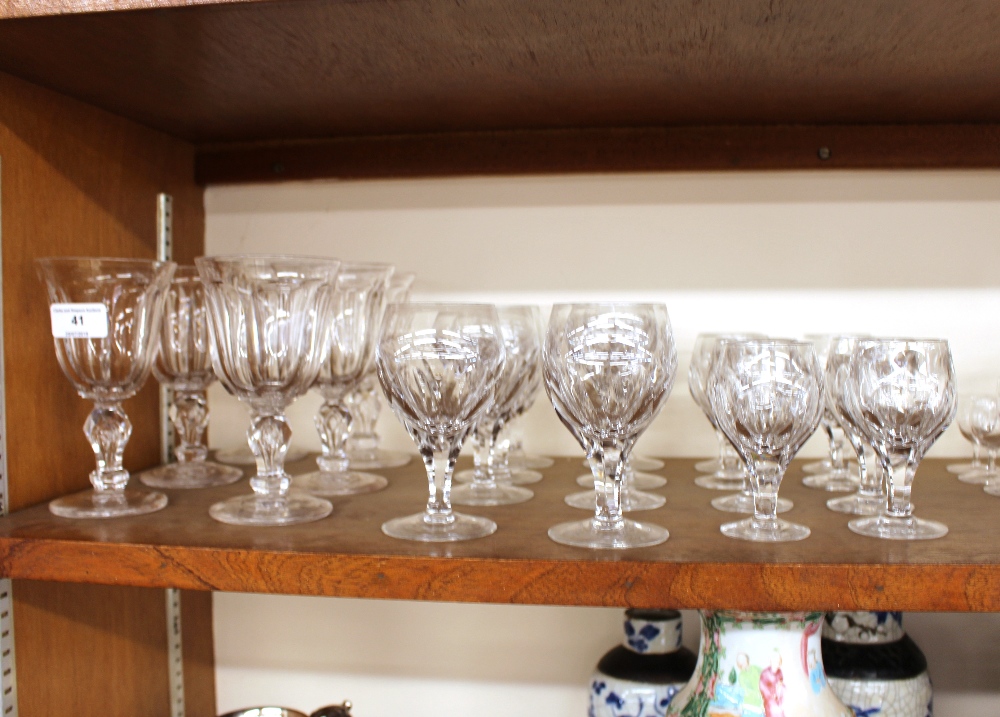 A suite of early 20th century dimpled table glasses, raised on faceted baluster stems and spread - Image 2 of 2