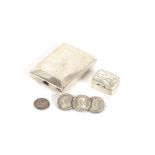 A silver matchbook case, Birmingham 1921; a small white metal pill box, stamped 925; a Victorian