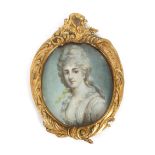 A 19th Century hand painted miniature on ivory, depicting a fashionable lady in floral gilt