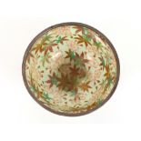 A fine white metal mounted and wired Oriental Plique a Jour bowl, intricately decorated with flowers