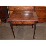 A George III mahogany side table, fitted with a single drawer and raised on rounded tapering