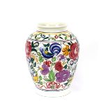 A large and colourful Poole pottery baluster vase, decorated with birds and flowers, impressed