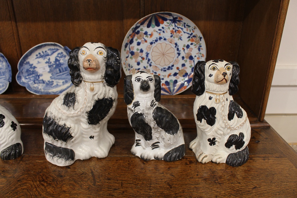 Four pairs of Victorian Staffordshire black and white spaniel ornaments; and a larger similar - Image 2 of 4