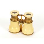 A pair of ivory and gilt metal mounted opera glasses