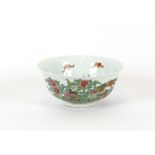 A 20th Century Chinese famille rose bowl, decorated with fruit and calligraphy, 19cm dia.