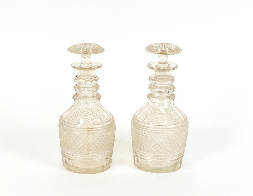 A pair of 19th Century hobnail cut glass decanters, of large size, having triple ring necks and