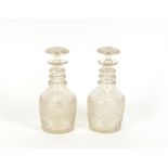 A pair of 19th Century hobnail cut glass decanters, of large size, having triple ring necks and