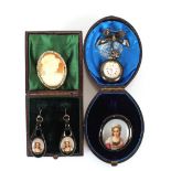 A late 19th Century portrait decorated brooch and ear-ring set; an oval white metal Cameo brooch and