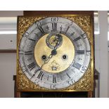 A Victorian carved oak long case clock, the brass spandril dial with steel chapter ring,