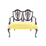 A hepplewhite style mahogany double chair back settee, raised on cabriole supports and claw feet,