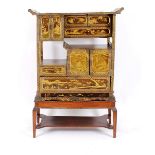 A Japanese Meiji period lacquer and gilt decorated Shodhana cabinet, fitted with drawers and shelves