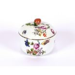An 18th Century Meissen porcelain bowl and cover, finely painted with flowers, the cover